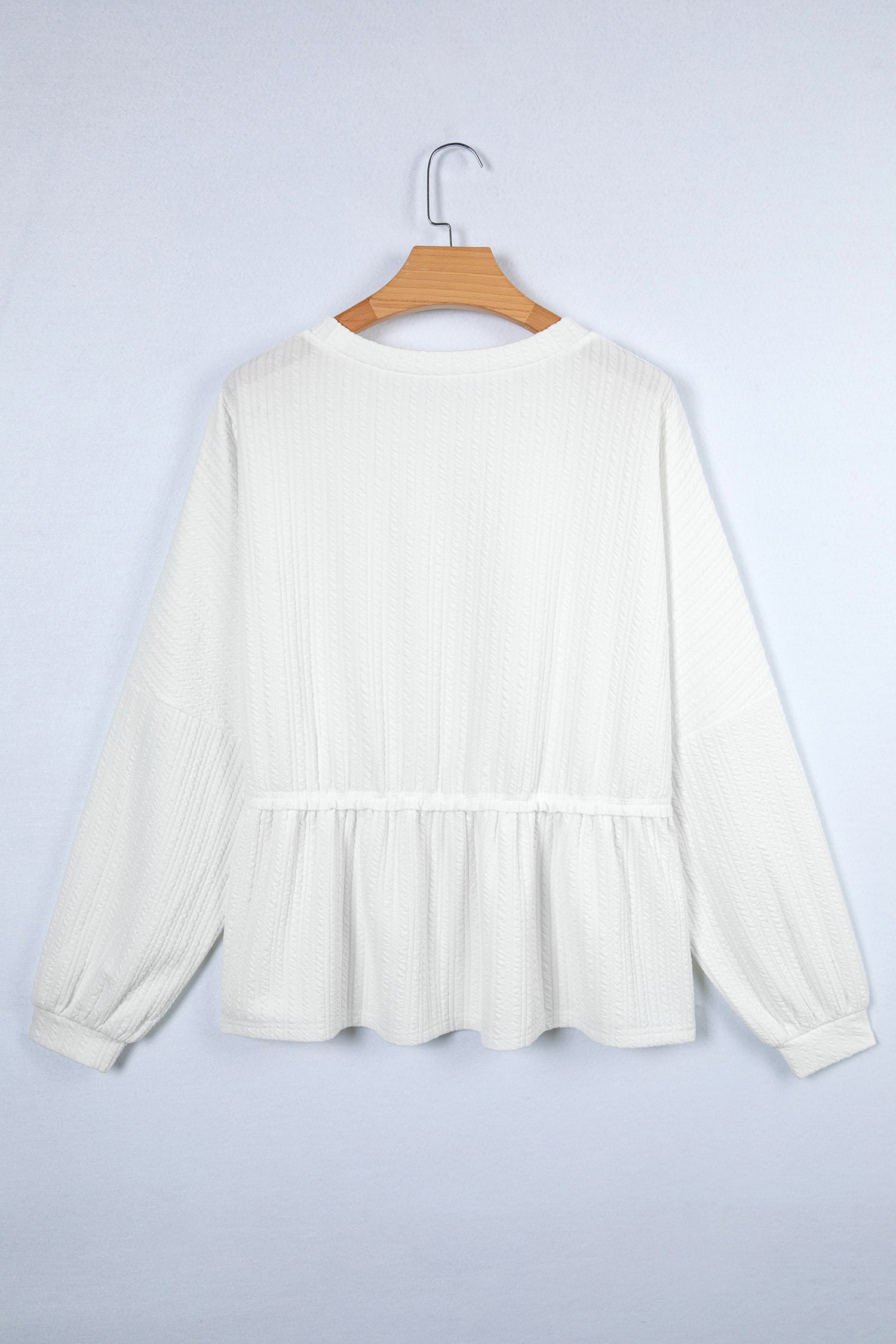 Solid Textured Drop Shoulder Peplum Top